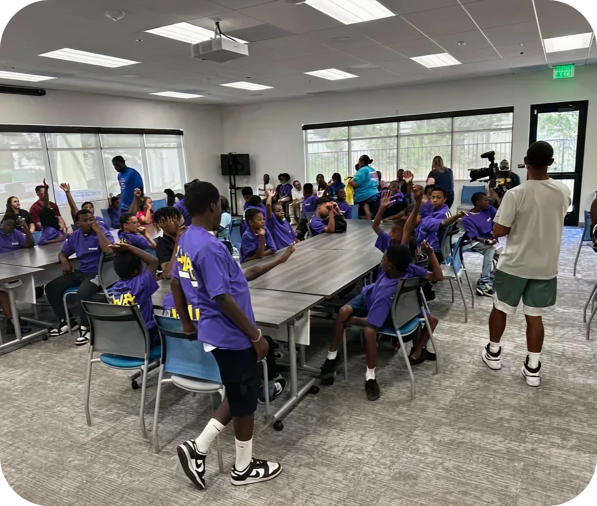 Engaged children in purple shirts